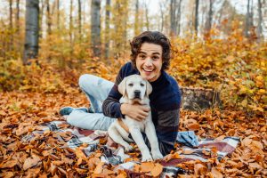 photo handsome man his dog spend time autumn forest 1 scaled