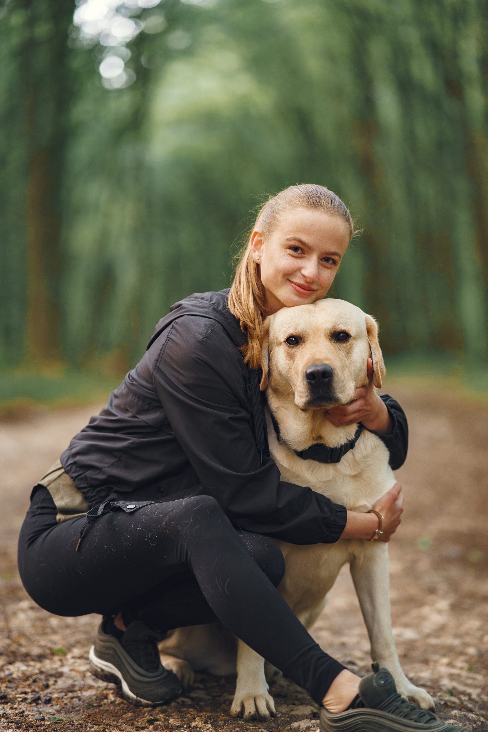 portrait woman with her beautiful dog scaled