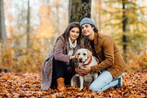 romantic happy couple love enjoying their time with labrador autumn park scaled